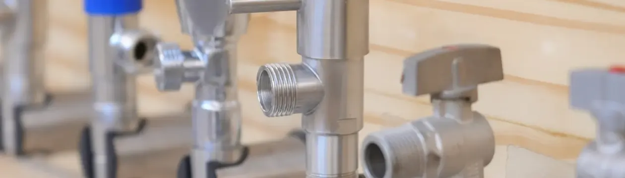 Angle valves and taps arranged on a display board
